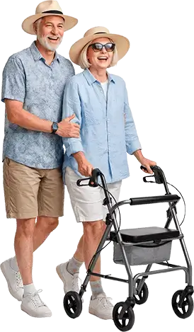 Pareja de turistas adultos mayores con andador